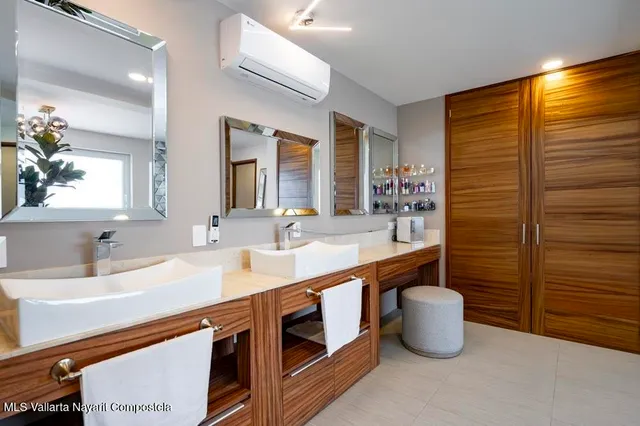 a bedroom with a bed and a table