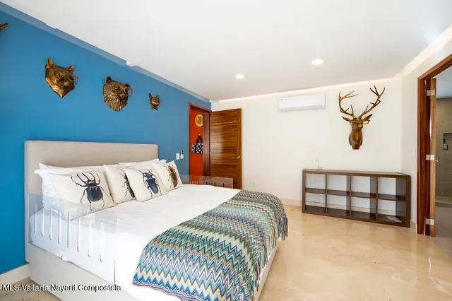 an aerial view of residential house with outdoor space and parking