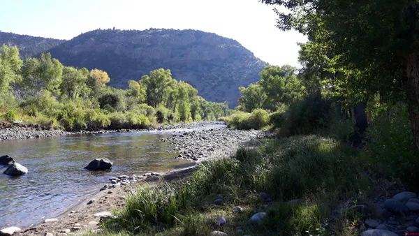 a view of a large body of water and mountain view