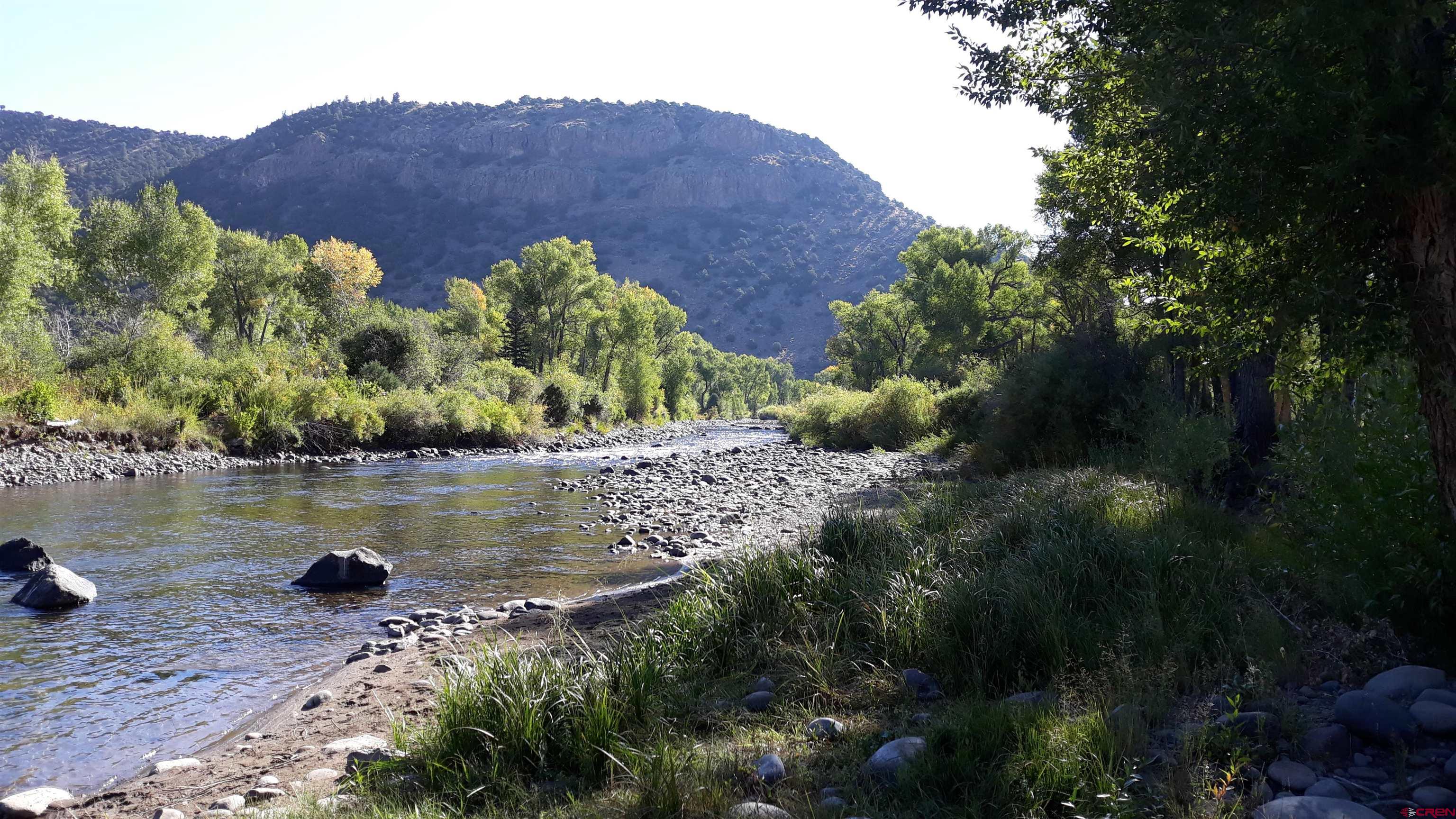 1 Conejos Trails Road Antonito, CO 81120 - Photo 3 of 20 a view of a large body of water and mountain view