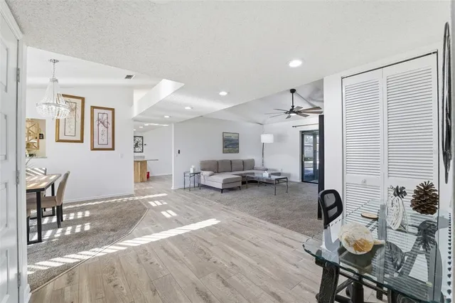 a living room with furniture and a table