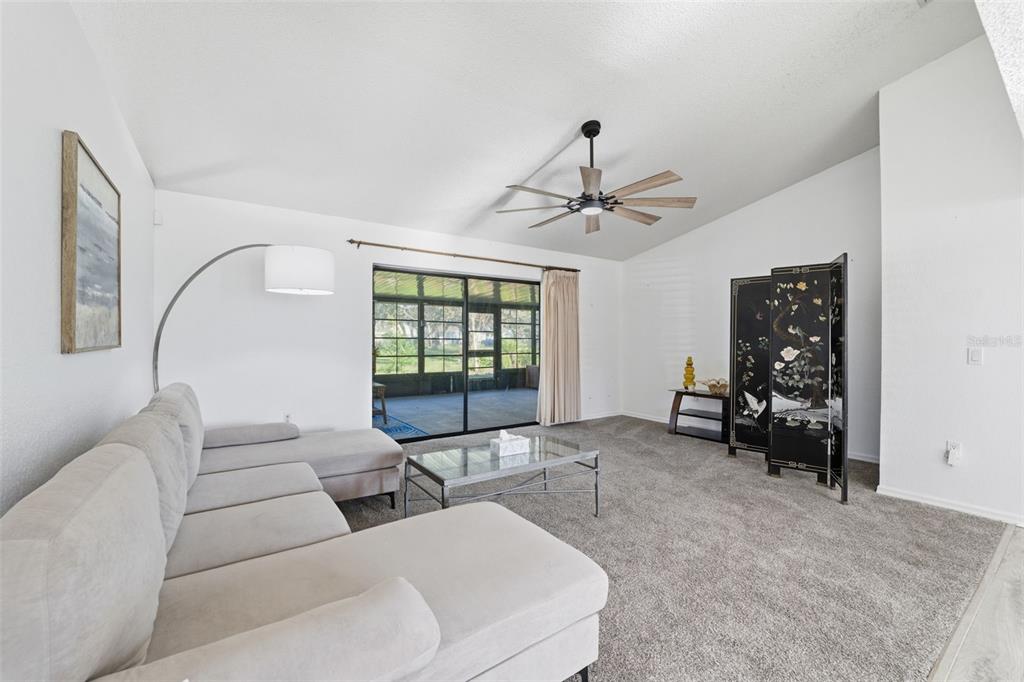 7822 Holiday Drive Spring Hill, FL 34606 - Photo 5 of 51 a living room with furniture and a window