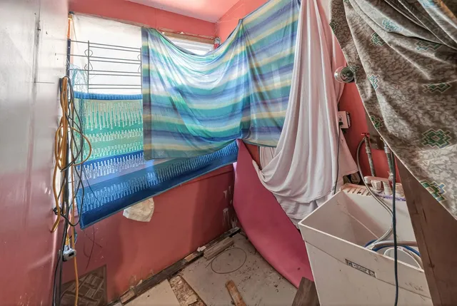 a bathroom with a bathtub sink and toilet