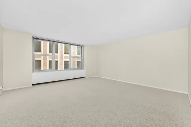an empty room with a window
