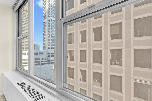 a view of a balcony with wooden floor