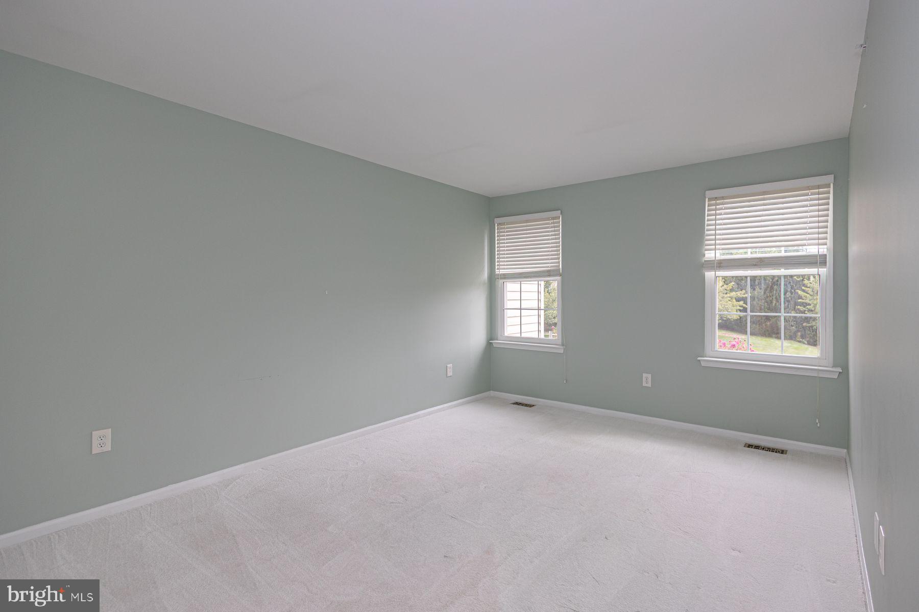 102 Waverly Lane, Unit 4 New Hope, PA 18938 - Photo 24 of 28 a view of an empty room with a window