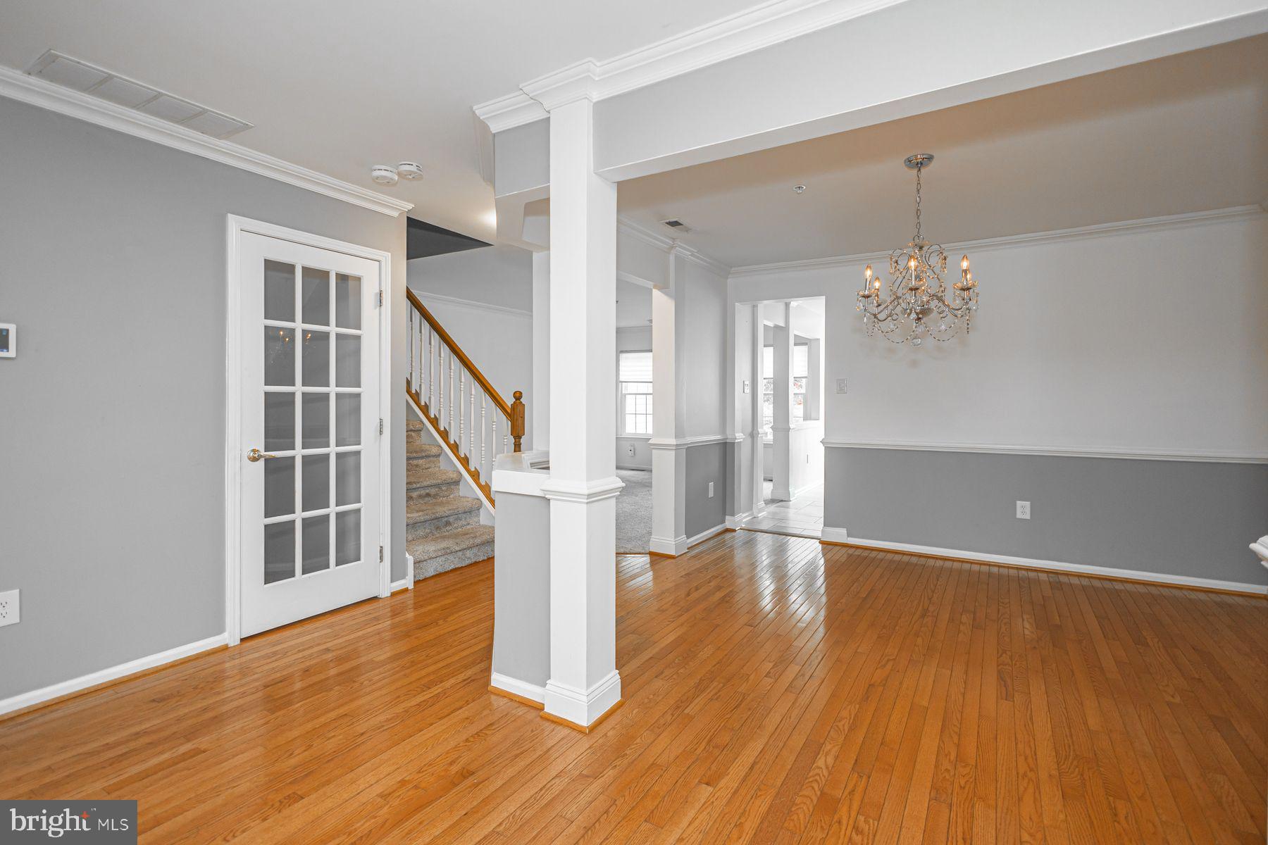 102 Waverly Lane, Unit 4 New Hope, PA 18938 - Photo 4 of 28 a view of empty room with wooden floor and fan