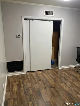 a view of a room with an empty space