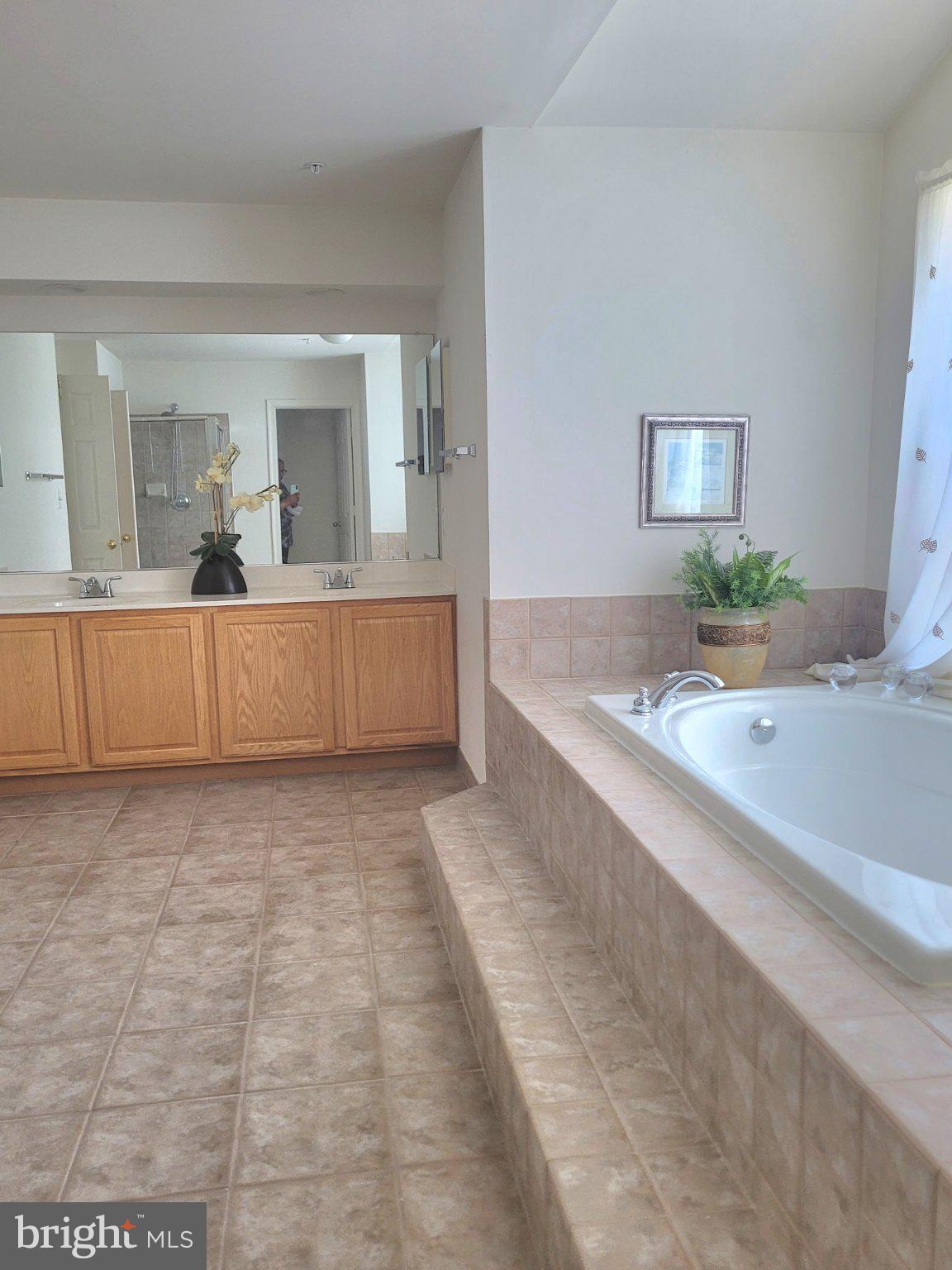 1202 Strausberg Street Accokeek, MD 20607 - Photo 35 of 43 Spacious bathroom with serene ambiance.