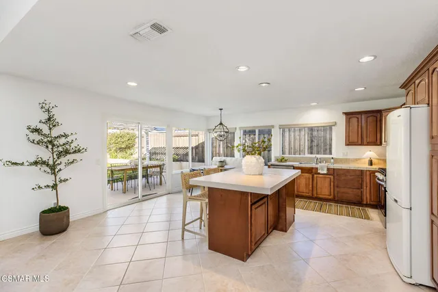 a kitchen with counter top space and appliances
