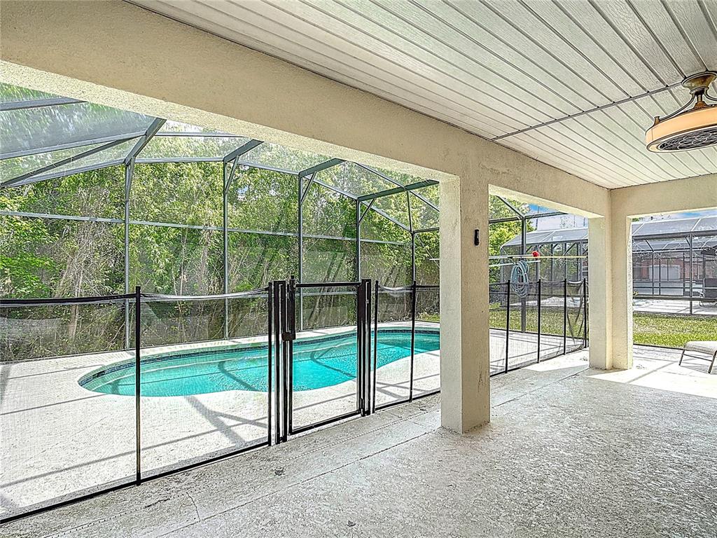 320 Mockingbird Road Davenport, FL 33896 - Photo 25 of 34 a view of a backyard