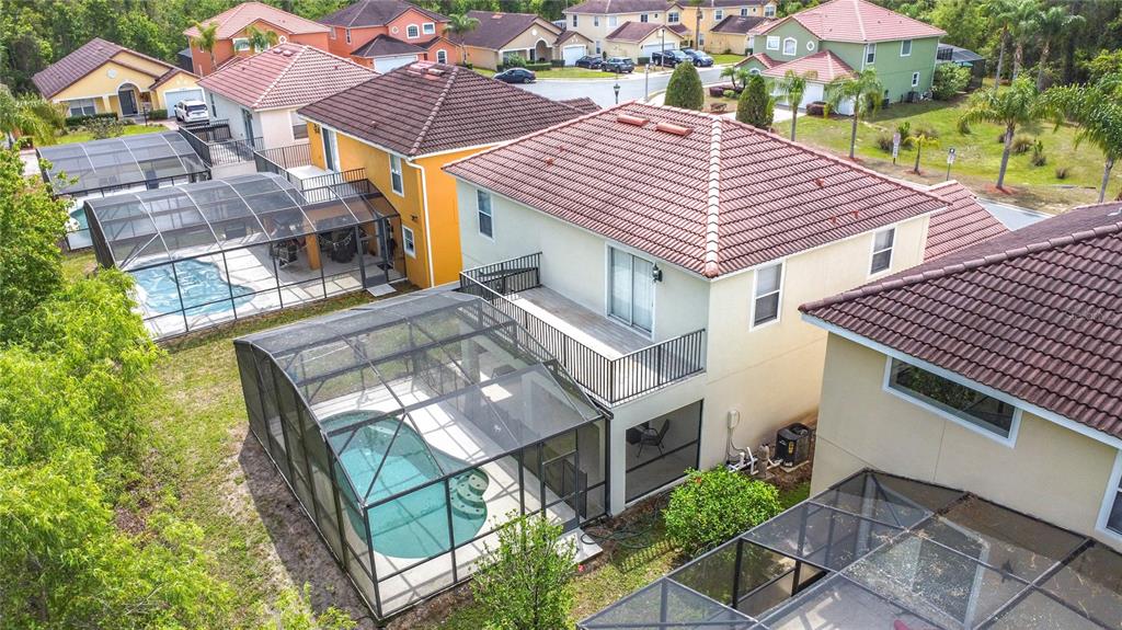 320 Mockingbird Road Davenport, FL 33896 - Photo 26 of 34 a aerial view of a house with a yard
