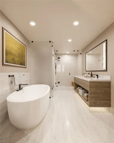 a spacious bathroom with a double vanity sink a mirror and a bathtub