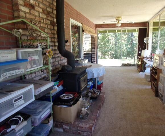16880 Ford Road Rogue River, OR 97537 - Photo 22 of 37 Very large sunroom with woodstove and great views!