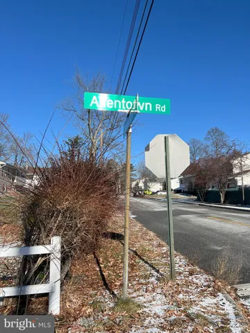 a sign that is on the side of a road