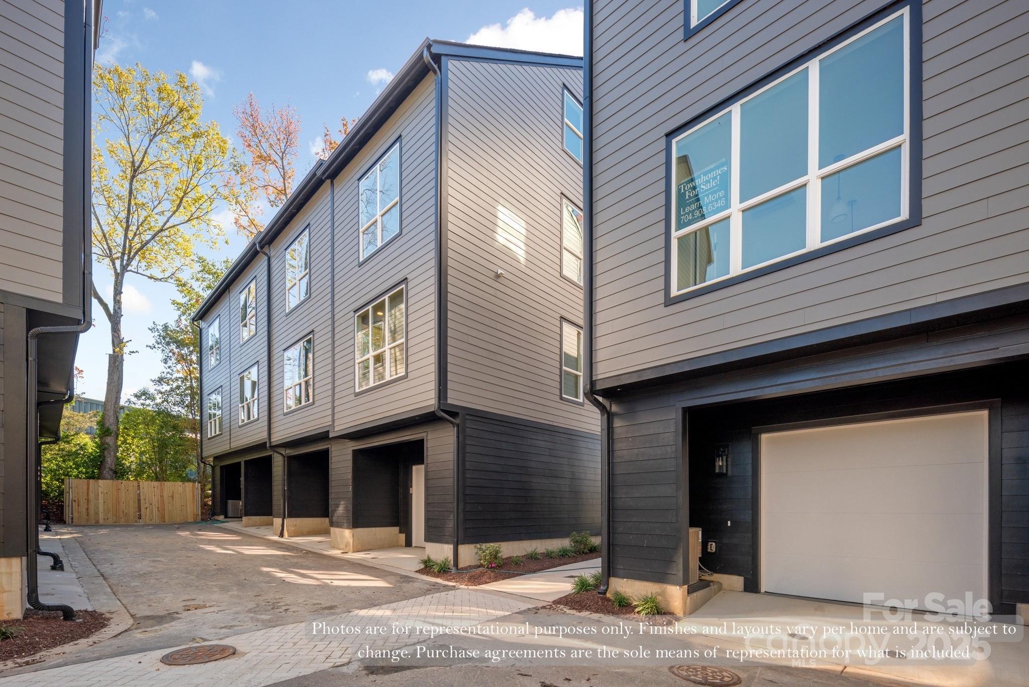 421 Devender Lane, Unit 2 Charlotte, NC 28217 - Photo 10 of 28 a view of a building with a street