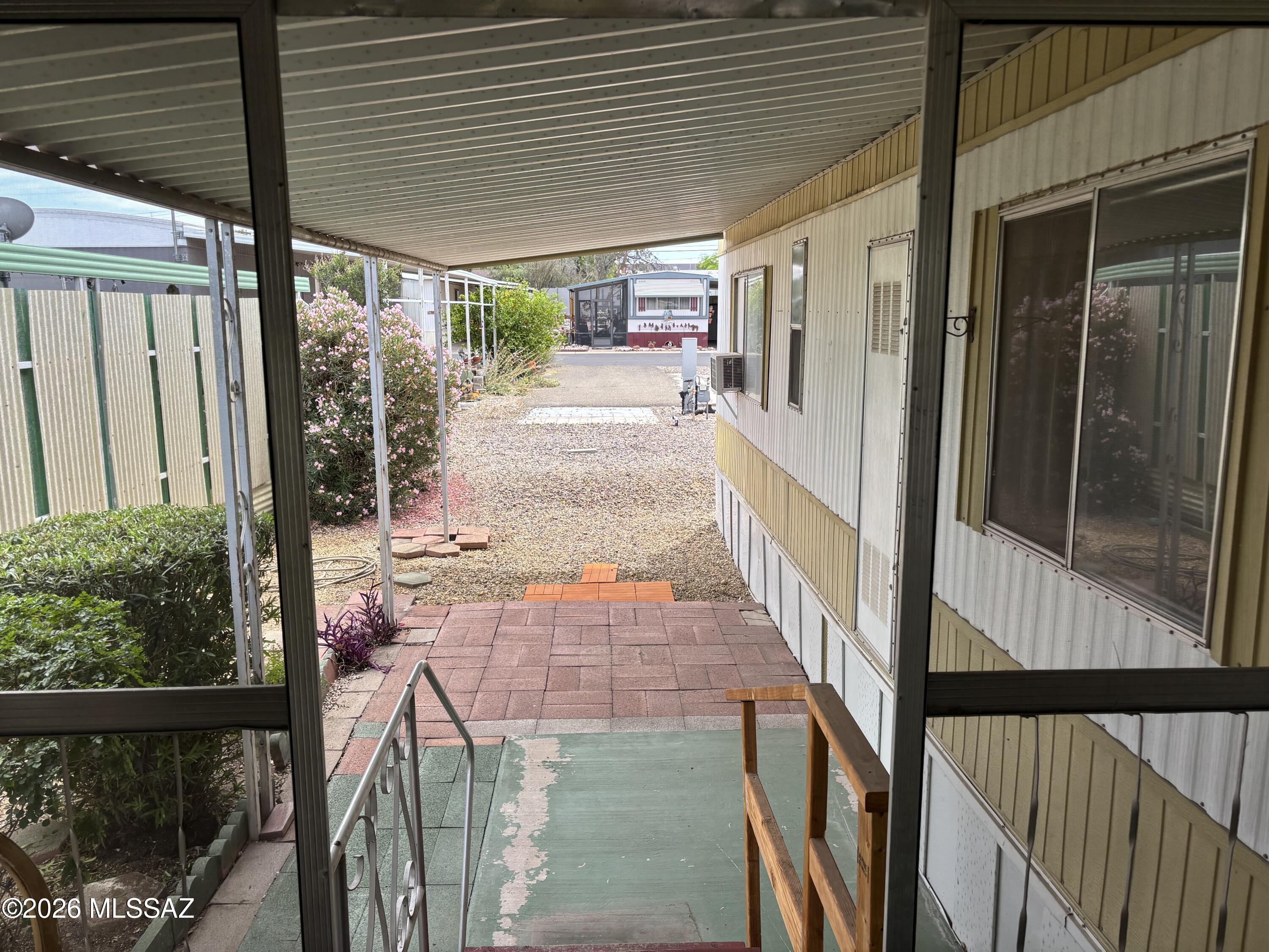 4550 North Flowing Wells Road, Unit 65 Tucson, AZ 85705 - Photo 38 of 50 a view of a porch