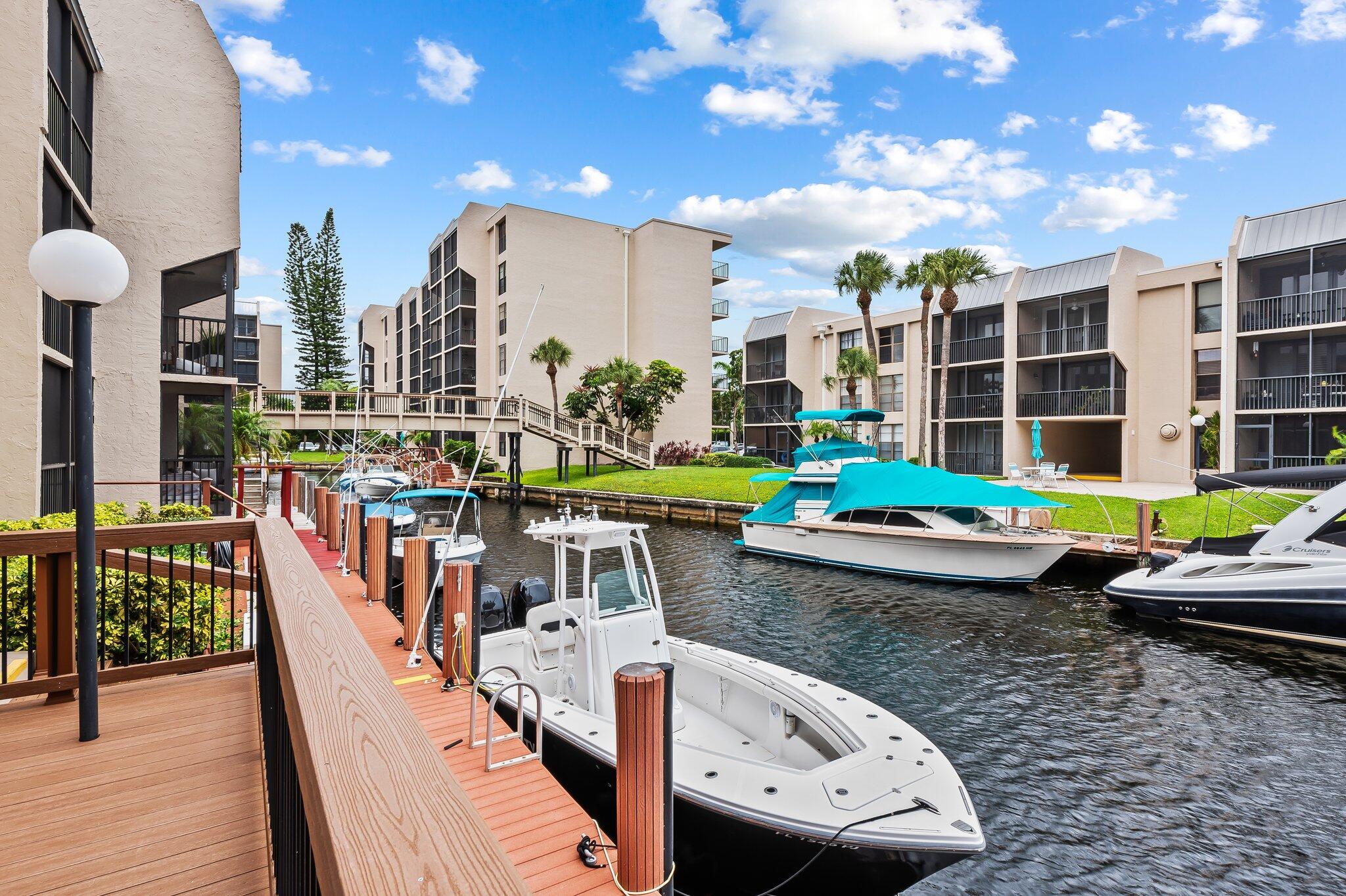 6 Royal Palm Way, Unit 509 Boca Raton, FL 33432 - Photo 20 of 23 a view of a balcony with chairs and potted plants