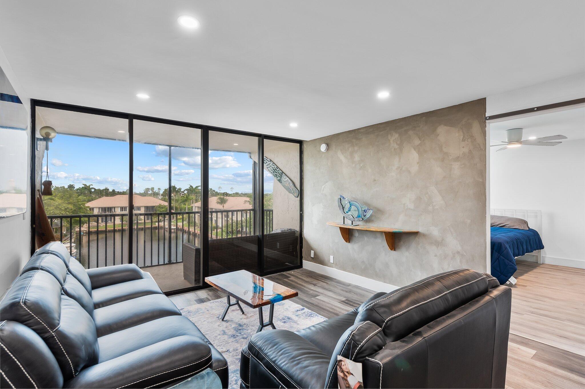 6 Royal Palm Way, Unit 509 Boca Raton, FL 33432 - Photo 8 of 23 a living room with furniture