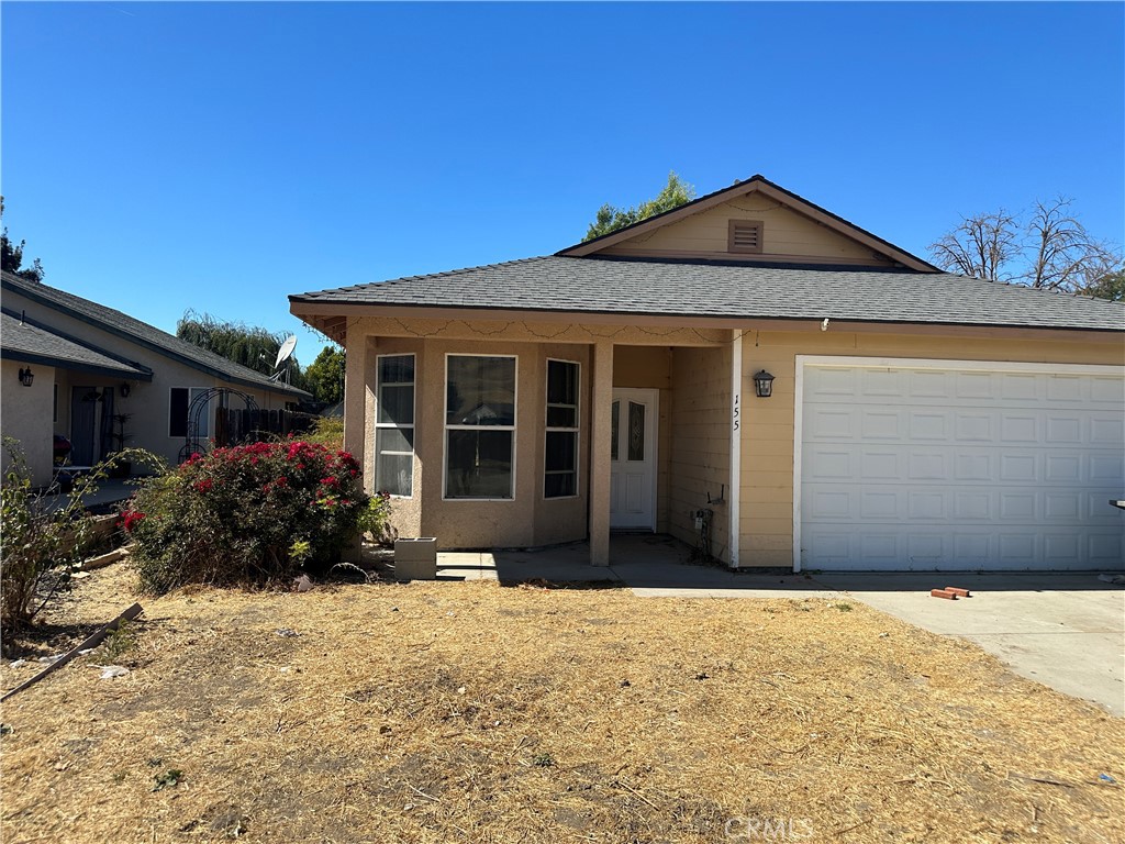 155 South 8th Street Shandon, CA 93461 - Photo 1 of 1 a front view of a house with a yard