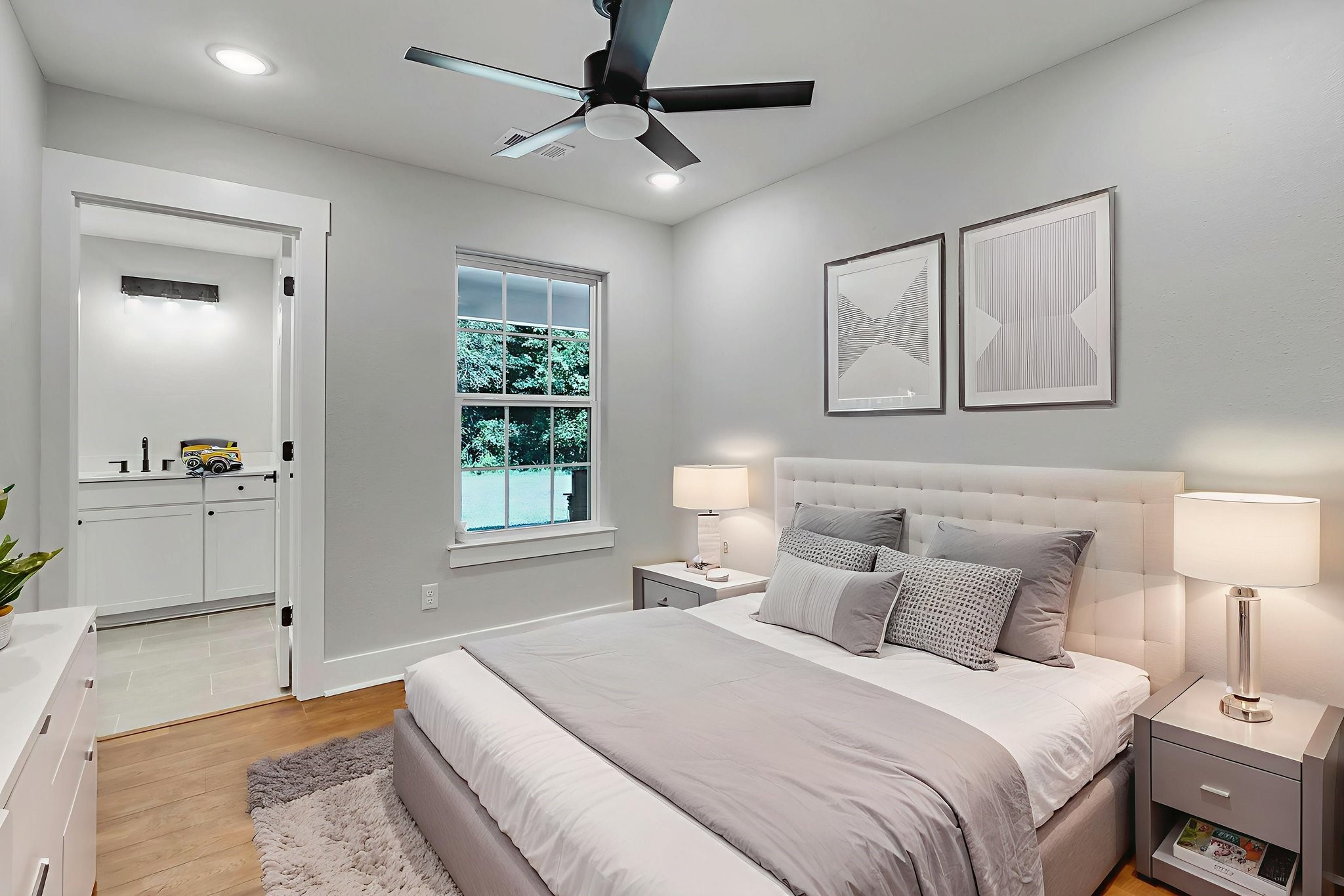 131 Pawnee Onalaska, TX 77360 - Photo 14 of 23 a bedroom with a bed and a window