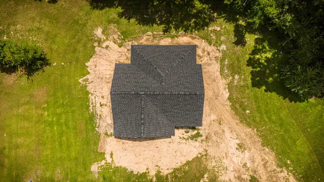 a building with a trees in front of it