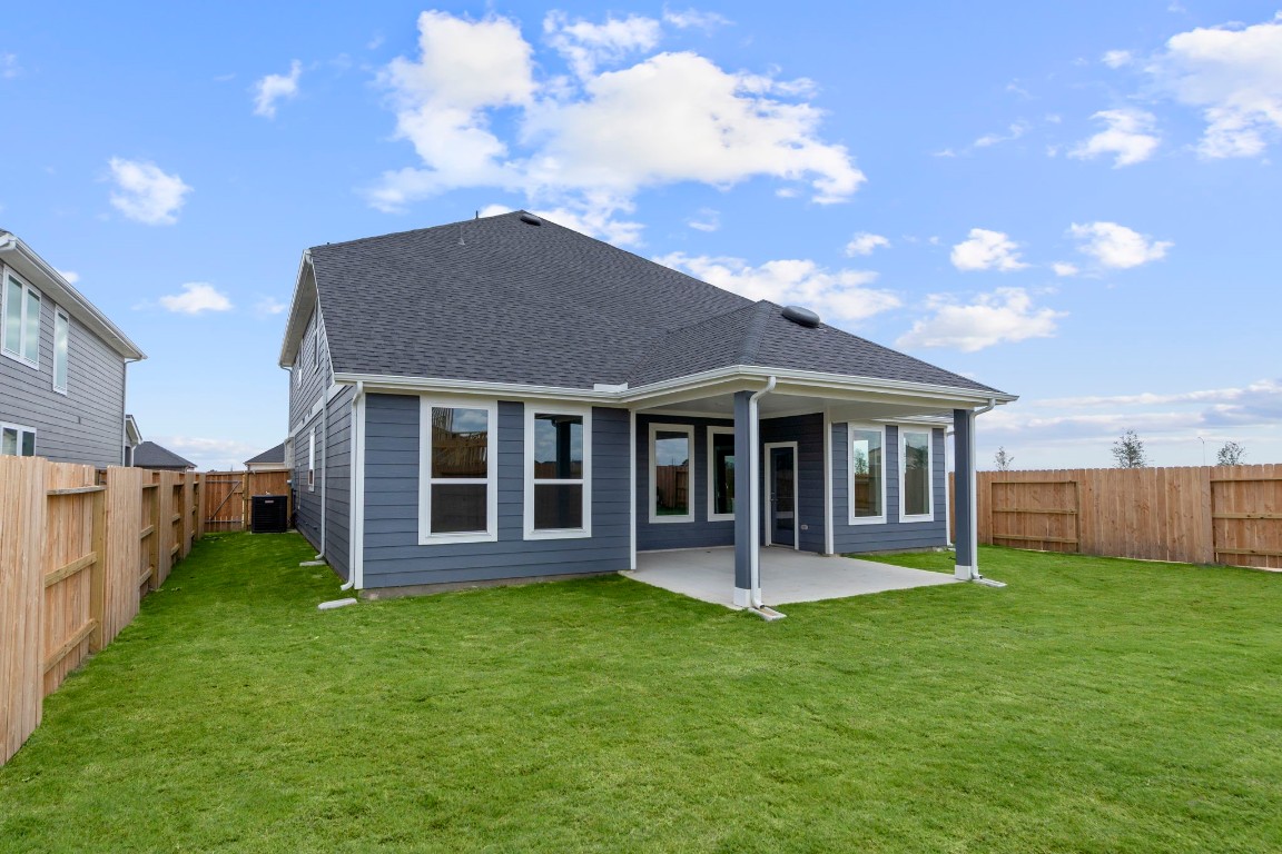 305 Gambels Quail Road Waller, TX 77484 - Photo 18 of 26 Whether you’re hosting a summer barbecue or enjoying a quiet evening at home, this beautiful new construction is ready to welcome you with open arms, making every moment feel special.