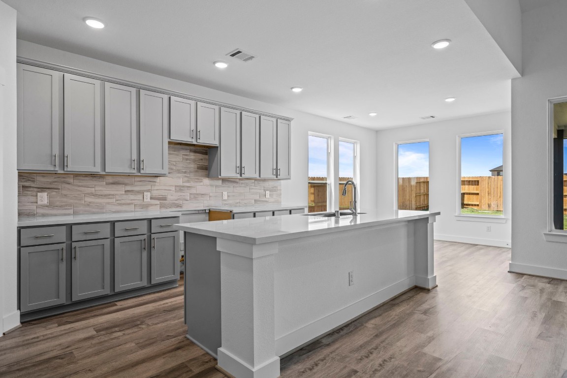 305 Gambels Quail Road Waller, TX 77484 - Photo 2 of 26 You can't miss this one; the CYPRESS II by Brohn Homes! Whip up a batch of Grandma's secret cookies recipe in this sleek stunner of a kitchen!