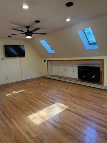 30 Groton Road Shirley, MA 01464 - Photo 16 of 25 a view of a livingroom with an empty space and a fireplace