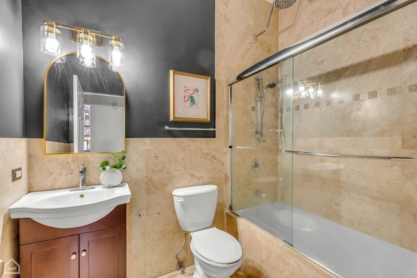 1001 West Altgeld Street, Unit 3 Chicago, IL 60614 - Photo 16 of 18 a bathroom with a sink toilet and shower