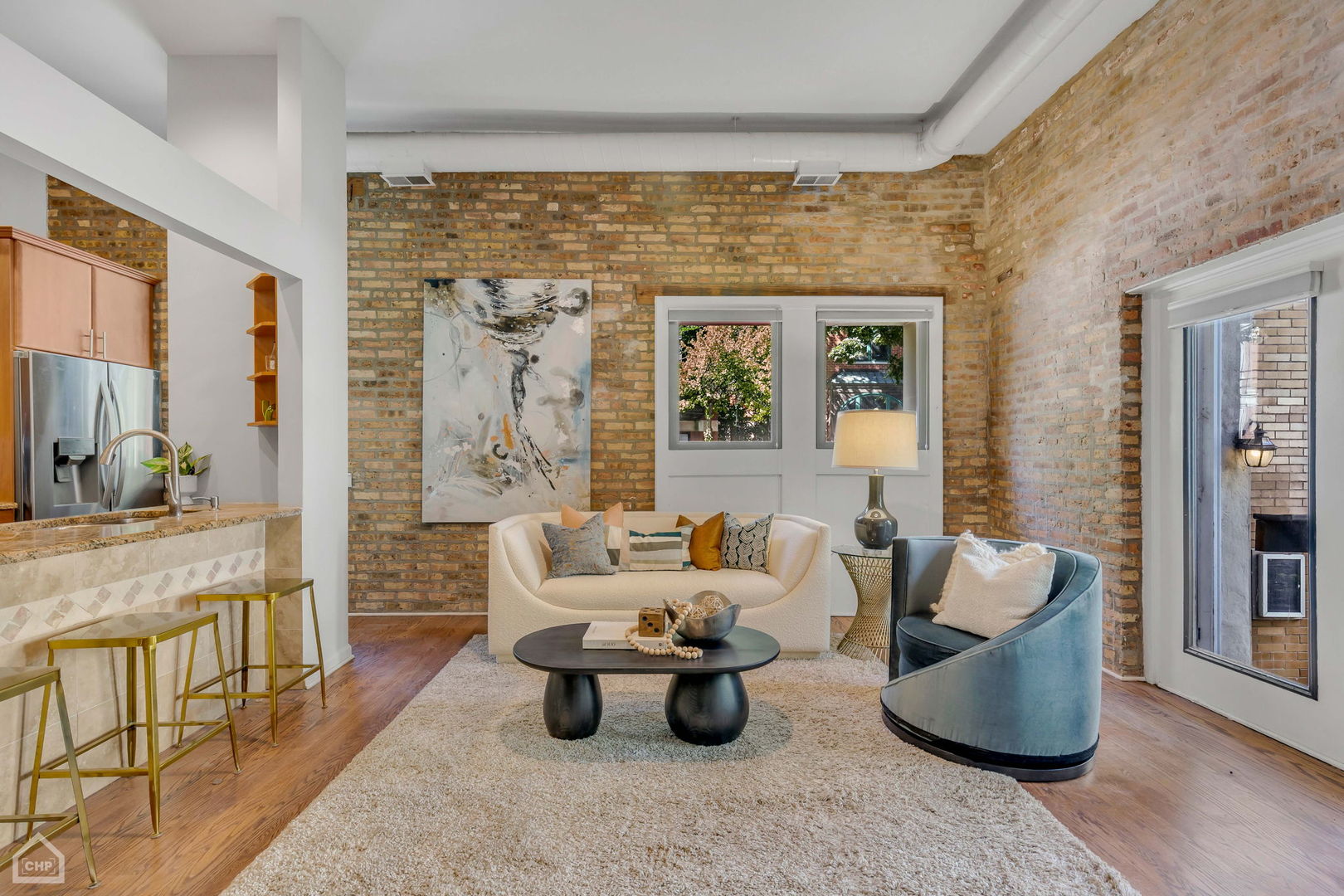 1001 West Altgeld Street, Unit 3 Chicago, IL 60614 - Photo 2 of 18 a living room with furniture and a large window