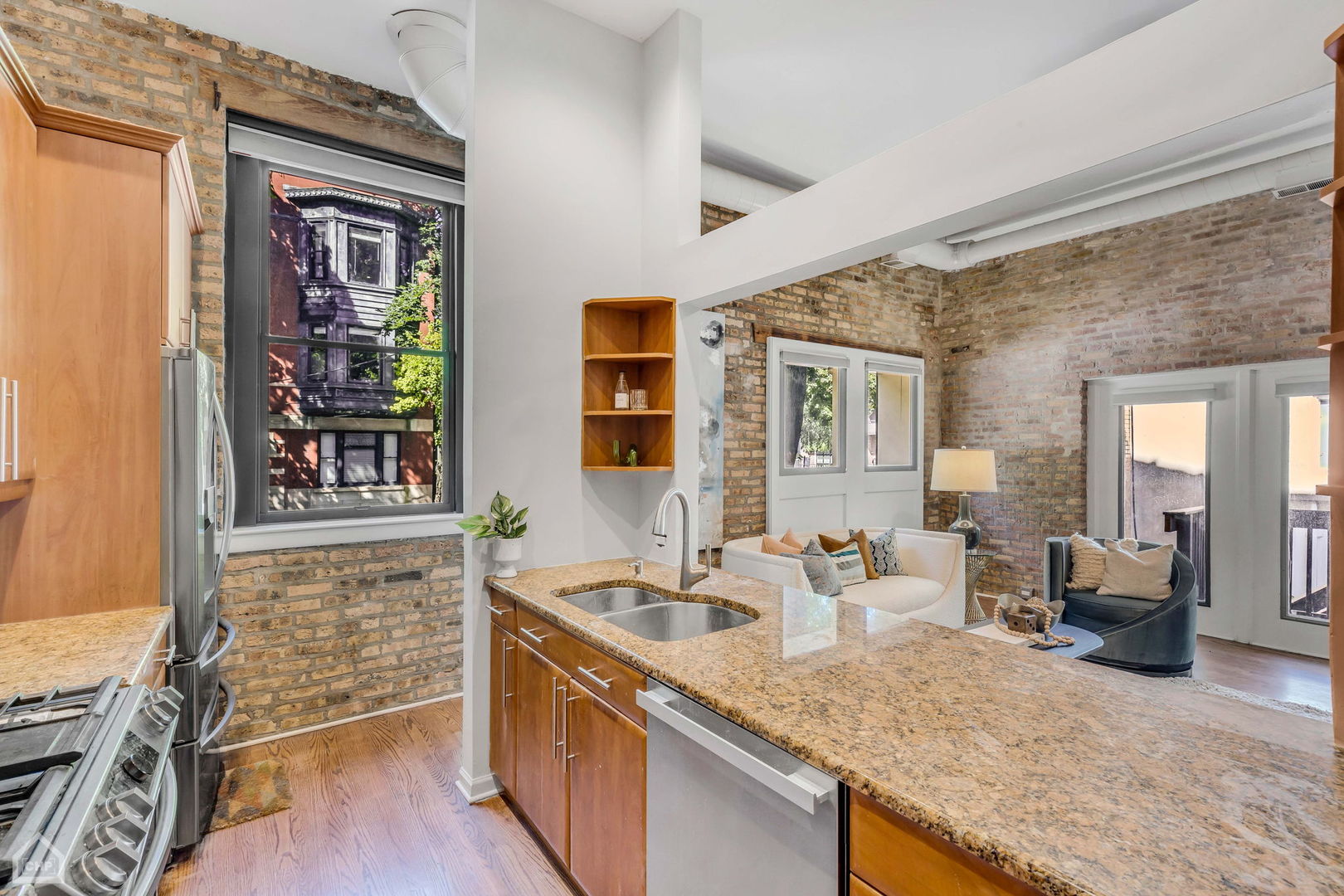 1001 West Altgeld Street, Unit 3 Chicago, IL 60614 - Photo 6 of 18 a spacious bathroom with a granite countertop sink and a large mirror