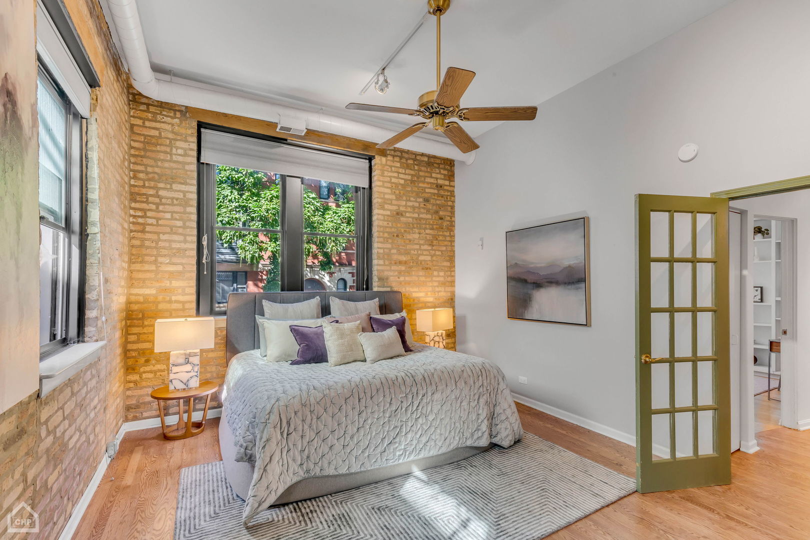 1001 West Altgeld Street, Unit 3 Chicago, IL 60614 - Photo 8 of 18 a bedroom with a large bed and a window