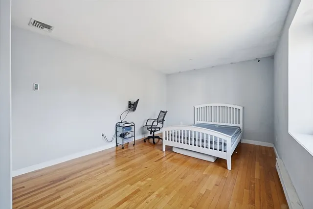 a view of livingroom with furniture and wooden floor