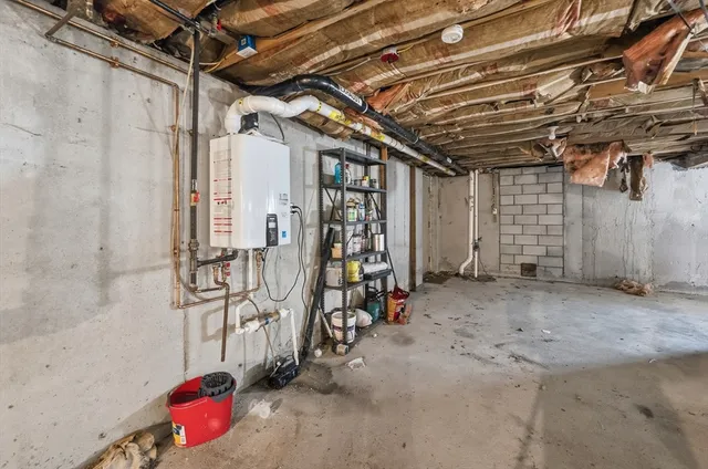 a view of a house with a wooden deck