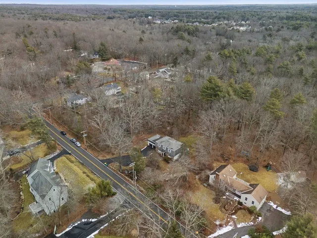 a picture of a bench in front of a window