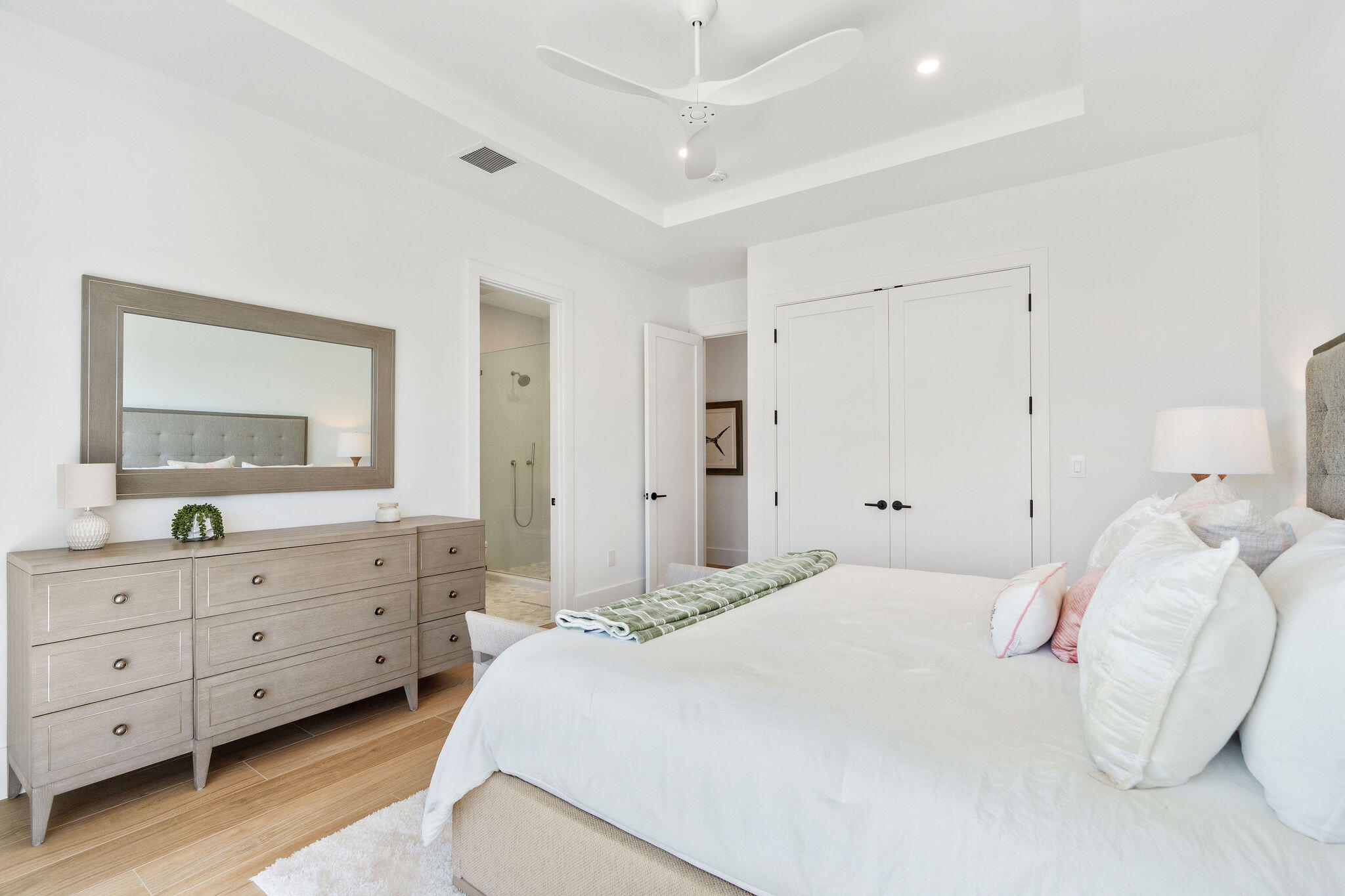 1002 Snapper Lane Key Largo, FL 33037 - Photo 34 of 106 a bedroom with a bed and a dresser