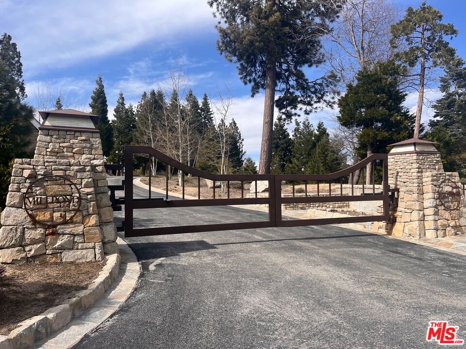 a view of a street with a building in the background