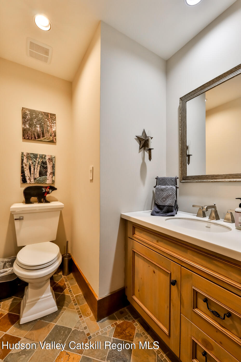 2 Watch Hill Lane, Unit 2 Windham, NY 12496 - Photo 13 of 41 a bathroom with a toilet a sink and mirror