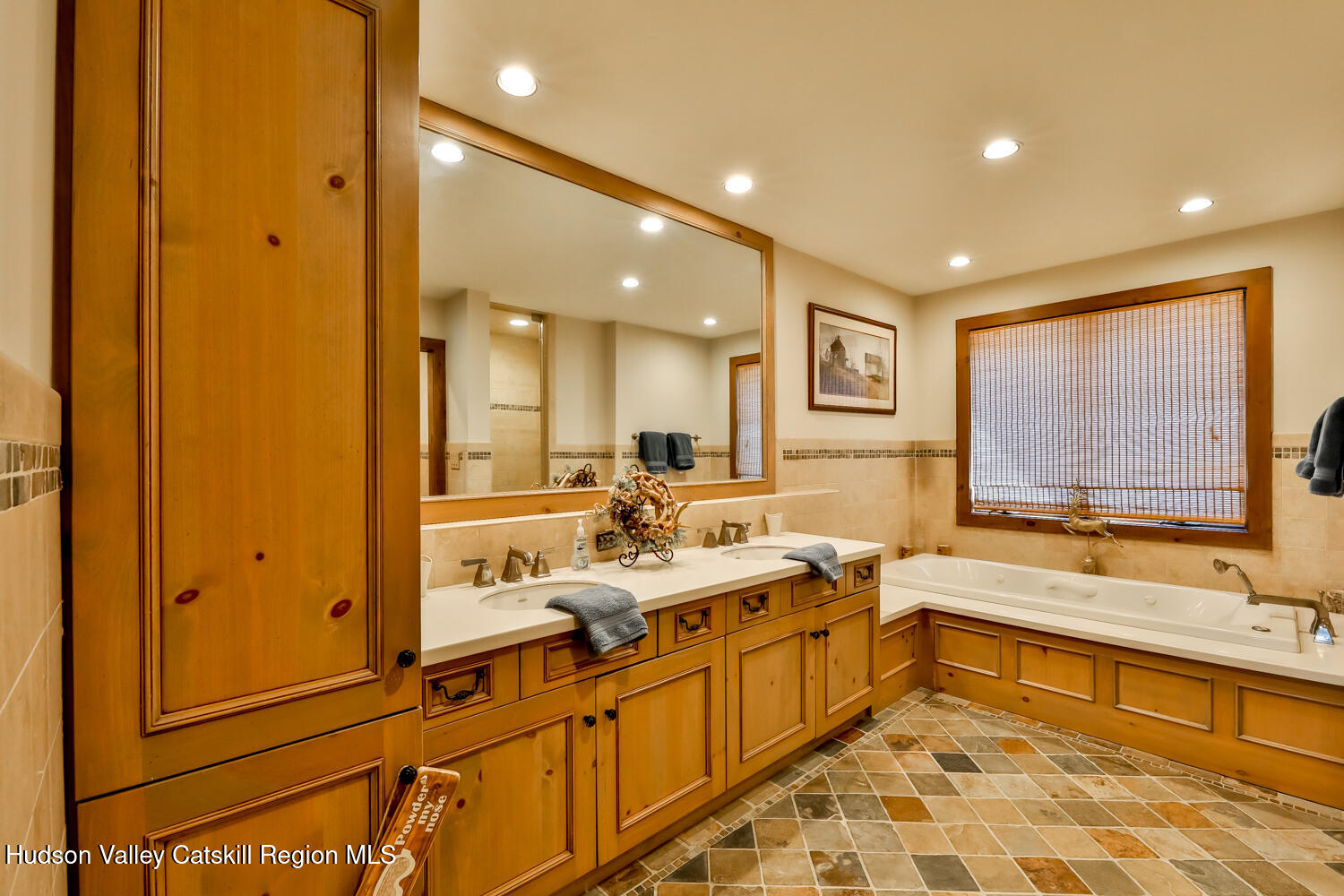 2 Watch Hill Lane, Unit 2 Windham, NY 12496 - Photo 26 of 41 a large bathroom with a large tub sink shower and mirror