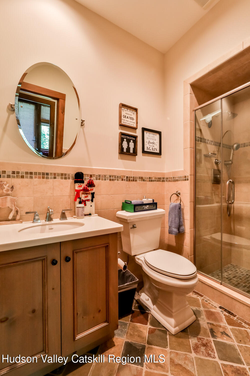 2 Watch Hill Lane, Unit 2 Windham, NY 12496 - Photo 35 of 41 a bathroom with a toilet a sink and a mirror