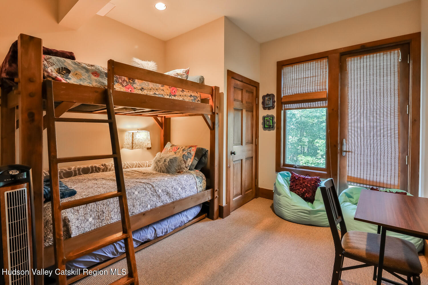 2 Watch Hill Lane, Unit 2 Windham, NY 12496 - Photo 39 of 41 a bedroom with a bed and a window