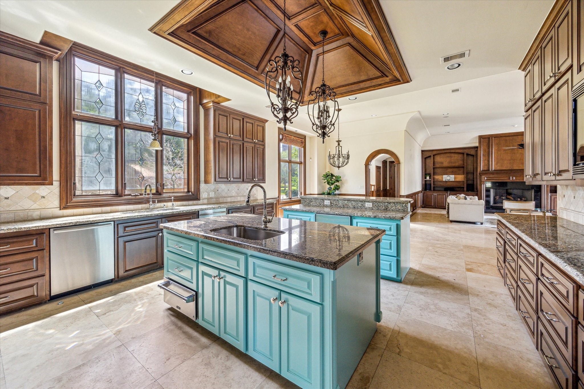5303 Longmont Drive Houston, TX 77056 - Photo 24 of 50 a kitchen with stainless steel appliances granite countertop a sink and cabinets