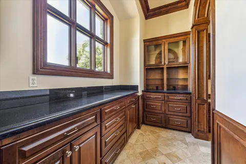 a kitchen with stainless steel appliances granite countertop a stove and a sink