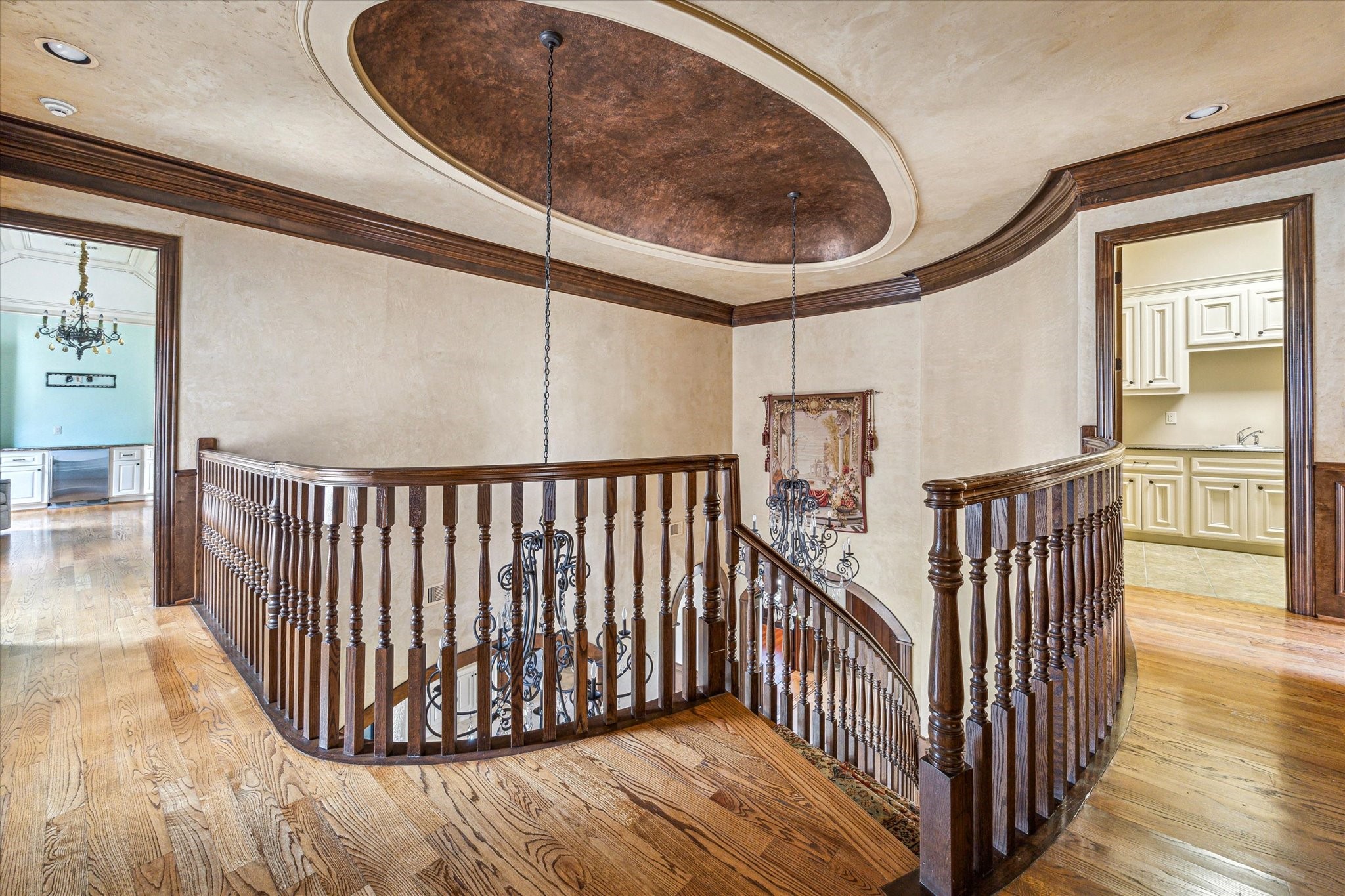 5303 Longmont Drive Houston, TX 77056 - Photo 28 of 50 a view of a hallway with wooden floor and staircase