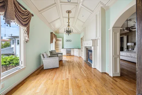 a view of living room kitchen and entryway