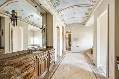 a view of a hallway with windows