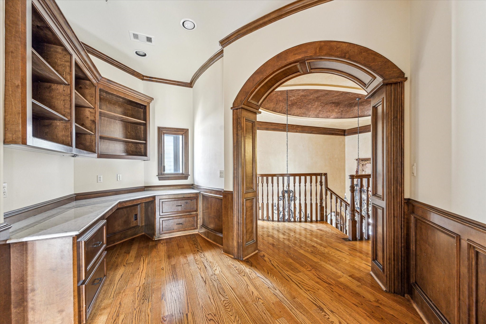 5303 Longmont Drive Houston, TX 77056 - Photo 36 of 50 a view of a kitchen with a sink and wooden floor