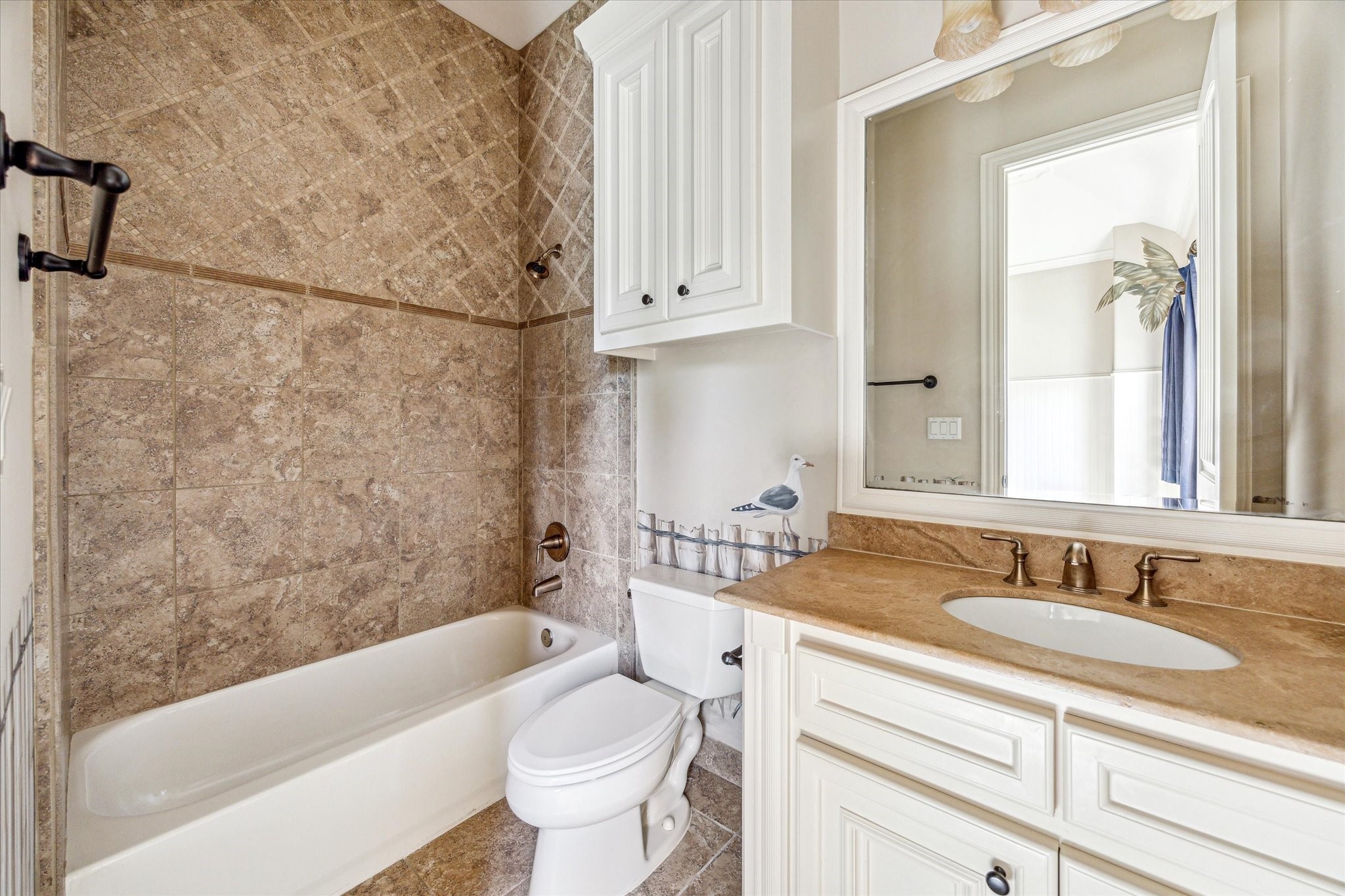 5303 Longmont Drive Houston, TX 77056 - Photo 44 of 50 a bathroom with a sink toilet and shower