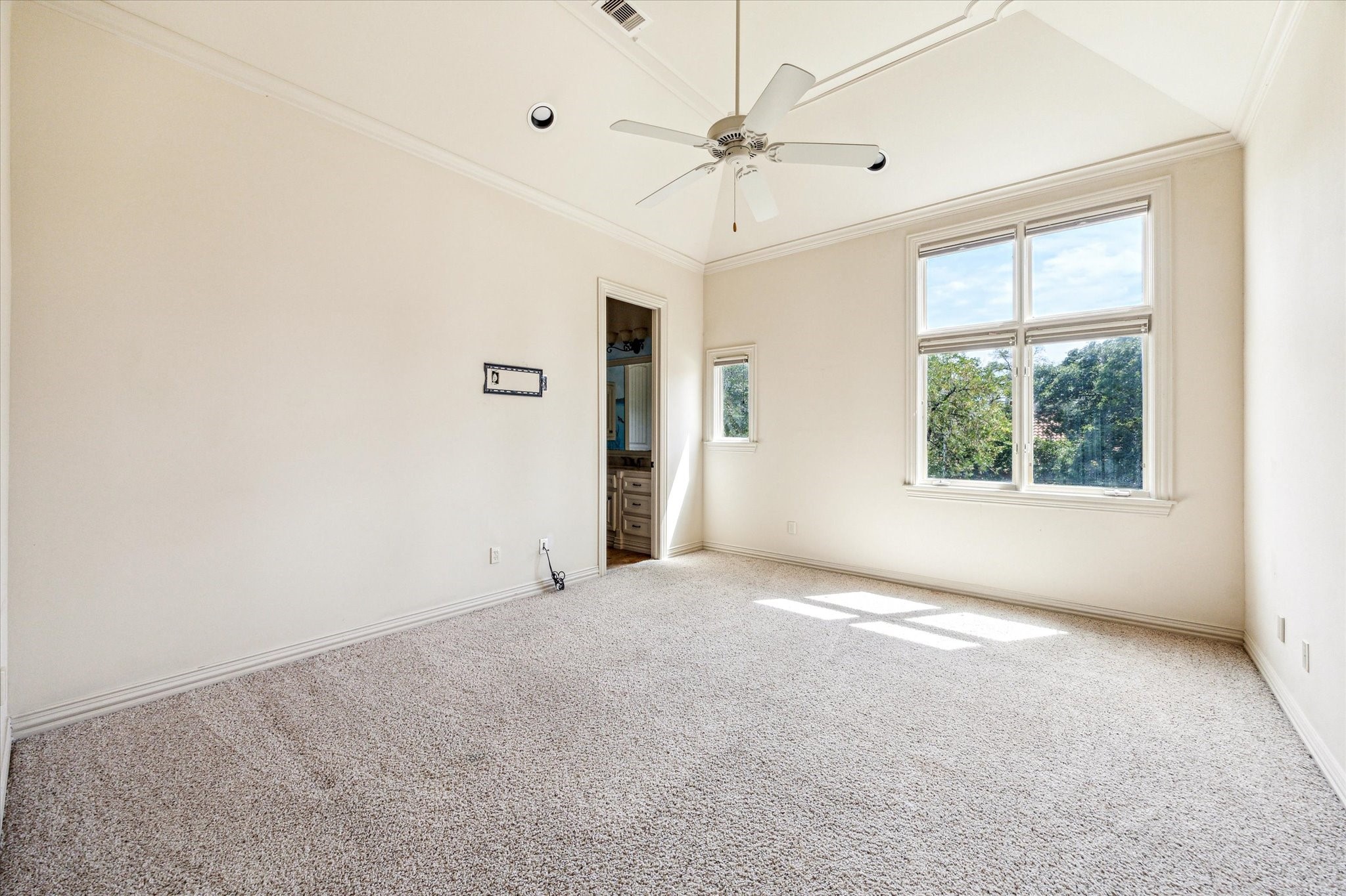 5303 Longmont Drive Houston, TX 77056 - Photo 45 of 50 an empty room with windows and fan